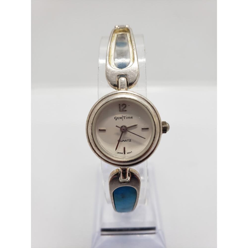 Gem Time women's dress watch. Small silver and white face. Blue bead band. GT-03